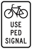 R9-5: BICYCLE SYMBOL W/ USE PED SIGNAL 12X18 