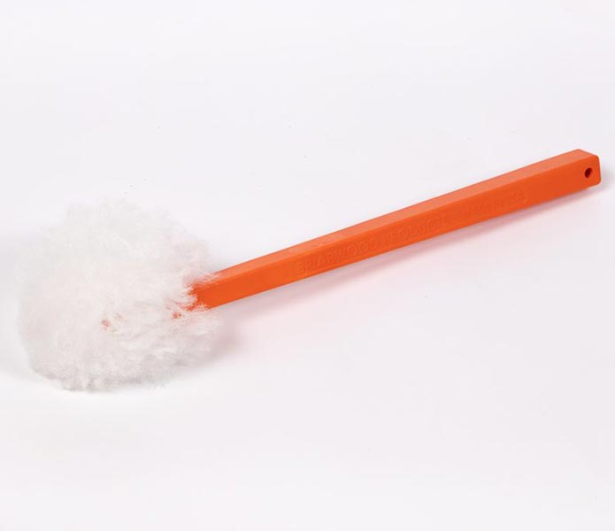 Toilet bowl cleaner with orange handle and white brush head.