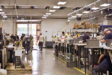 Production floor in IPI's Fort Dodge location lined with work stations manned by incarcerated men