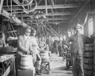 Incarcerated men in the 1900's constructing wooden butter tubs for IPI