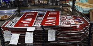 Photo of stop signs in the Anamosa Sign Shop