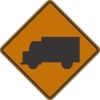 W11-10: TRUCK CROSSING SYMBOL 48X48 