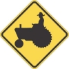 W11-5: FARM VEHICLE SYMBOL 36X36 